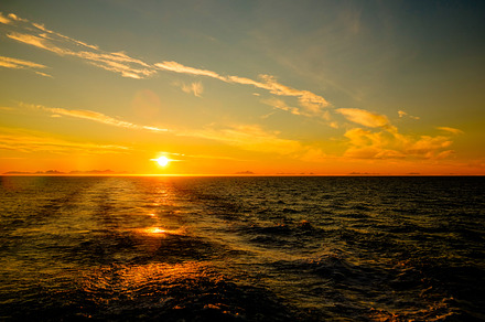 Sunset and sunrise over the sea and Lofoten archipelfgo from the Moskenes - Bod
