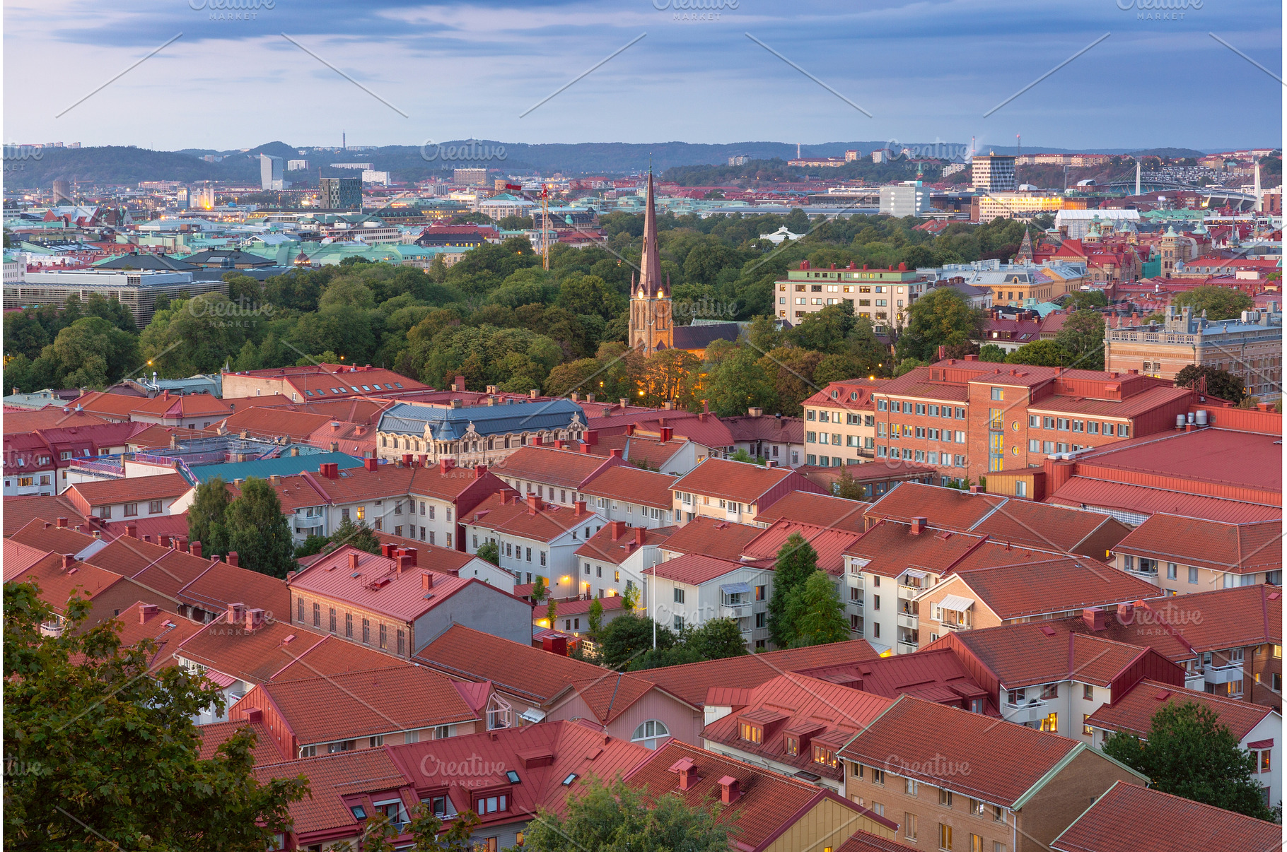 Church spire above Gothenburg, an Architecture Photo by kavalenkava