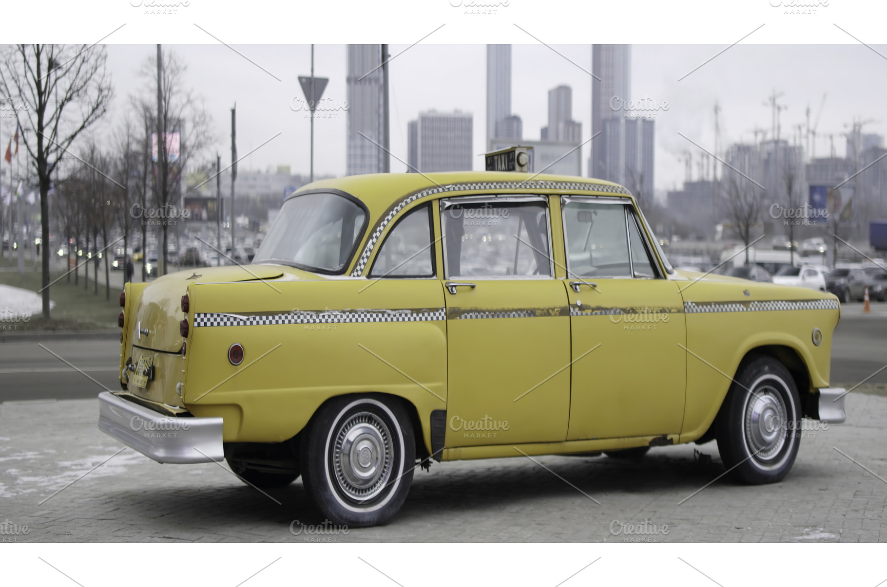 Classic yellow checker cab rotating, a Transportation Photo by Media Whale Stock