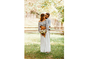 Eclectic rustic wedding couple