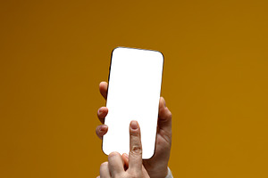 Close-up of female hands holding modern smartphone with blank wh, a Technology Photo by ndanko