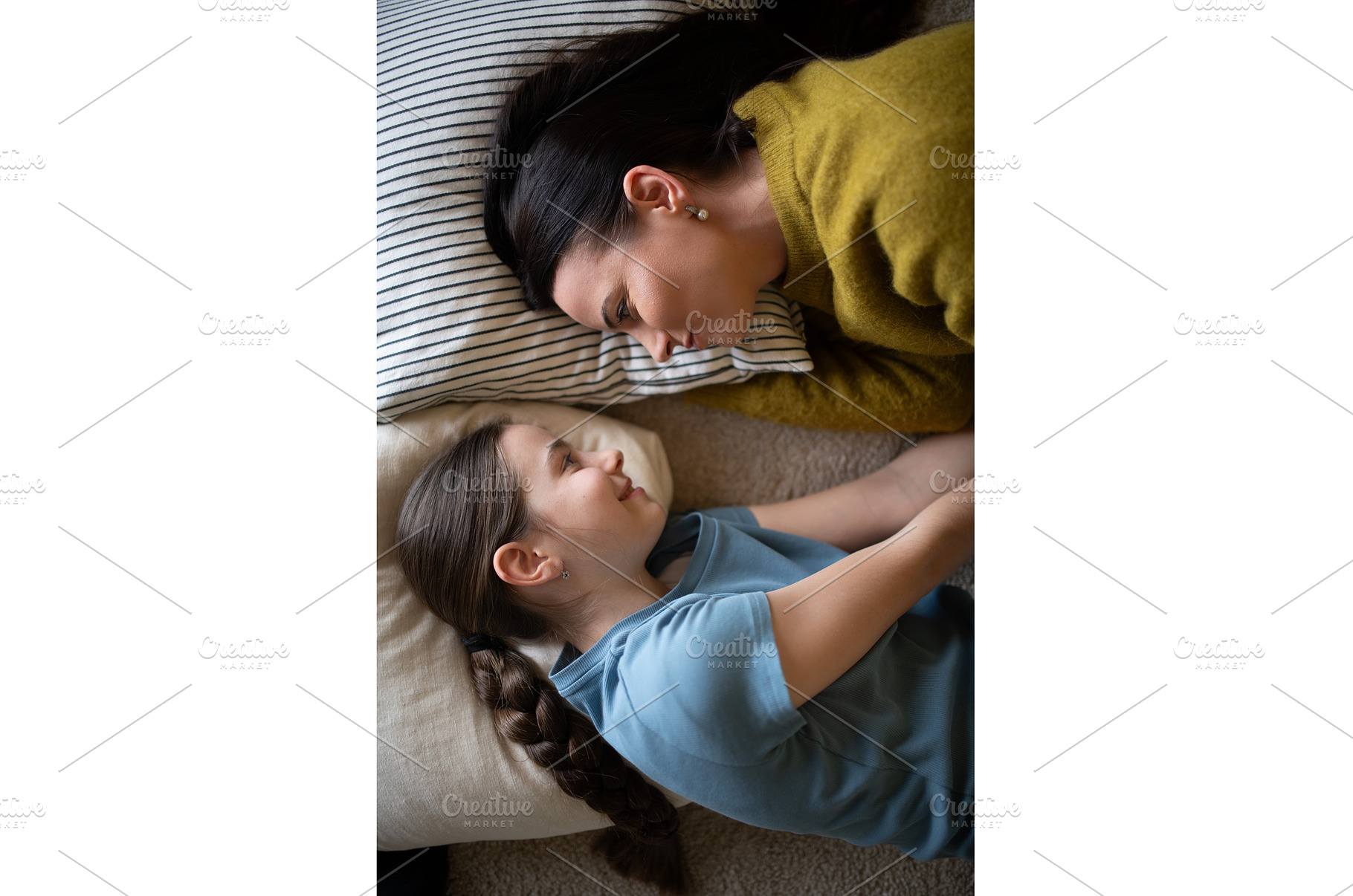Top view of girl and mom talking in, a Person Photo by HalfPoint