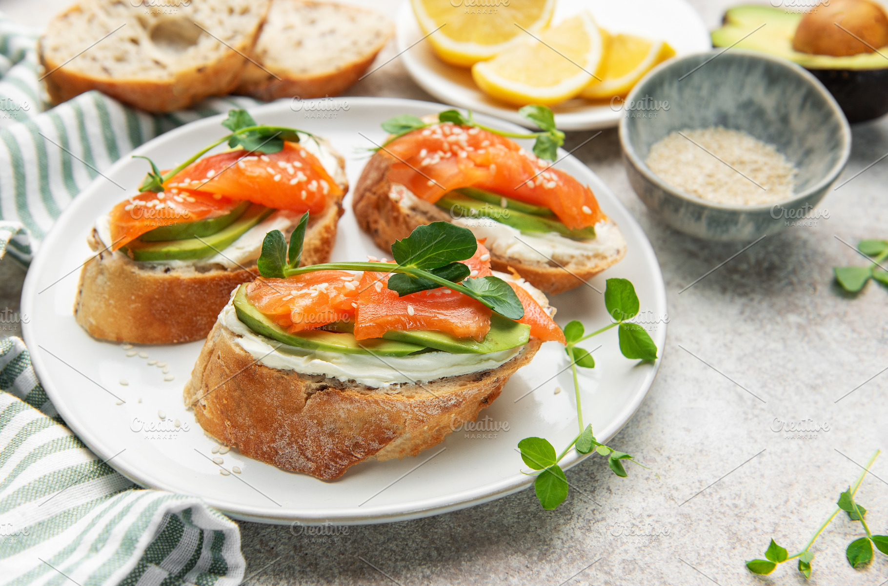 Bruschetta with salmon, avocado, and cream cheese, a Food & Drink Photo by Olena Rudo