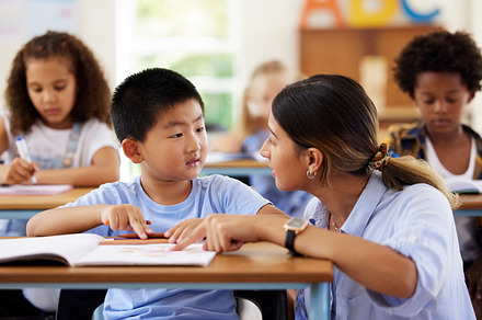 Teachers build a close personal connection with each child in their care, a Photo by Peopleimages.com