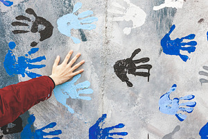 Human palm on wall with hand prints, an Arts & Entertainment Photo by BOOCYS
