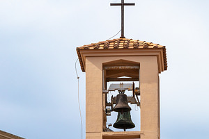 Bell tower with cross of Conservatorio Santissima Annunziata in Empoli, Tuscany, a Photo by Antonio Gravante Market
