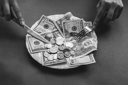 Money lying on the plate containing accounting, background, and bank