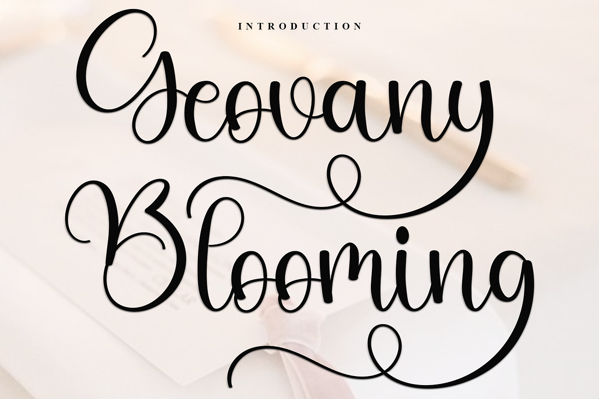 Geovany Blooming, a Handwritten Font by FreshTypeINK (Photo 1 of 7)