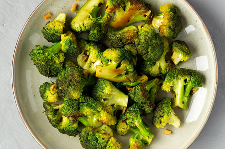Homemade Pan-Fried Broccoli on a Plate, top view. Flat lay, over, a Food & Drink Photo by LiudmylaChuhunova