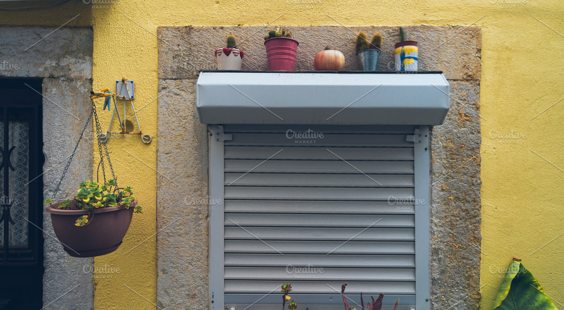 Yellow Lisbon Facade with Plants, an Architecture Photo by SkyNext