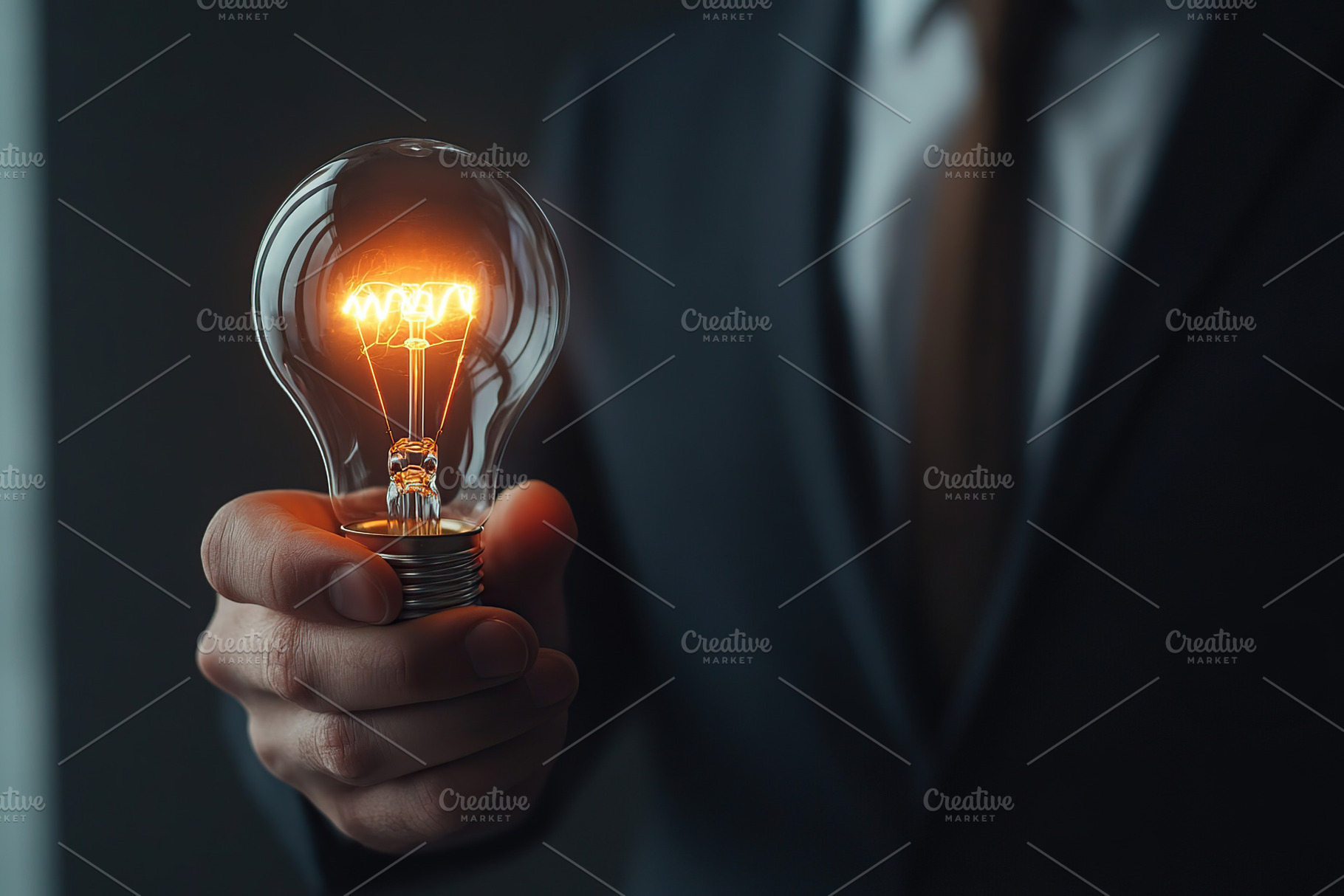 Illuminated lightbulb in businessman hands. AI technology concep, a Business Photo by AlyaAnd