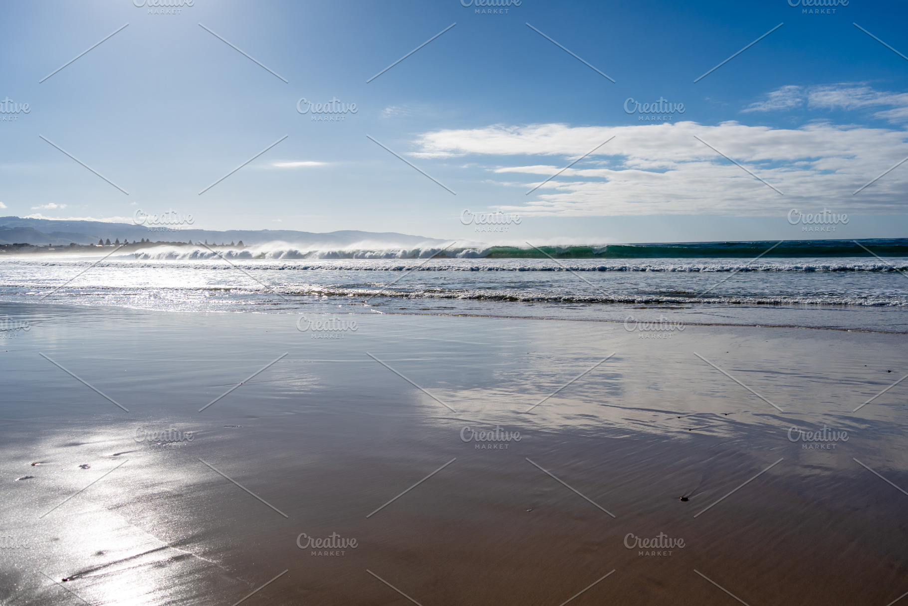 Sandy beach along the Great Ocean Road, Australia under cloudy s, a Nature Photo by GoodGoods