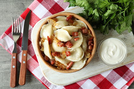 Concept of tasty food with vareniki or pierogi, top view, a Food & Drink Photo by AtlasStudio PRO