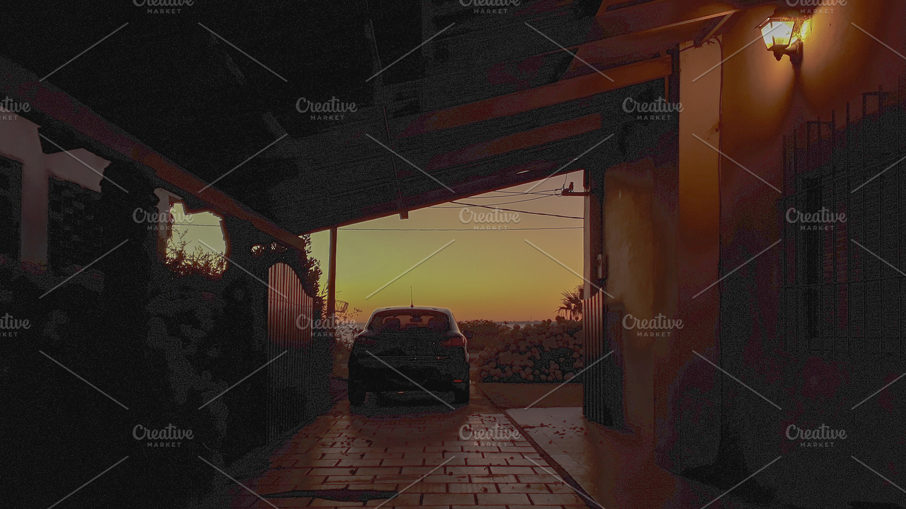 Driveway with car parked under warm sunset light, a Nature Photo by DanFLCreativo