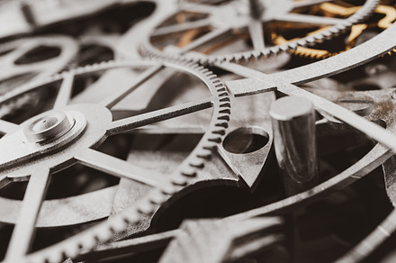 Gears and cogs in watch mechanism containing craft, gears, and gear, an Industrial Photo by Photocreo Michal Bednarek