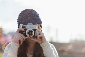 Woman with a Retro Camera