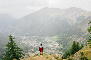 Hiker enjoys the view in the alps featuring mountain, view, and hike