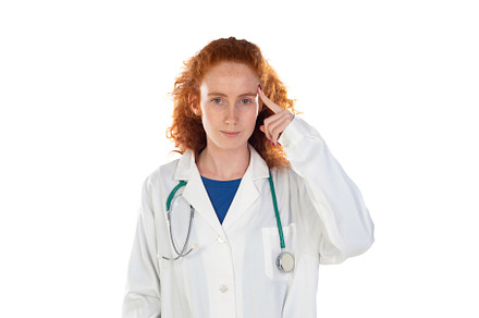 Redhead doctor woman laughing, a Person Photo by José Manuel Gelpi