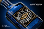Deep Blue Bottle Mockup, a Packaging Mockup by Gleb Guralnyk (Thumbnail 1 of 3)