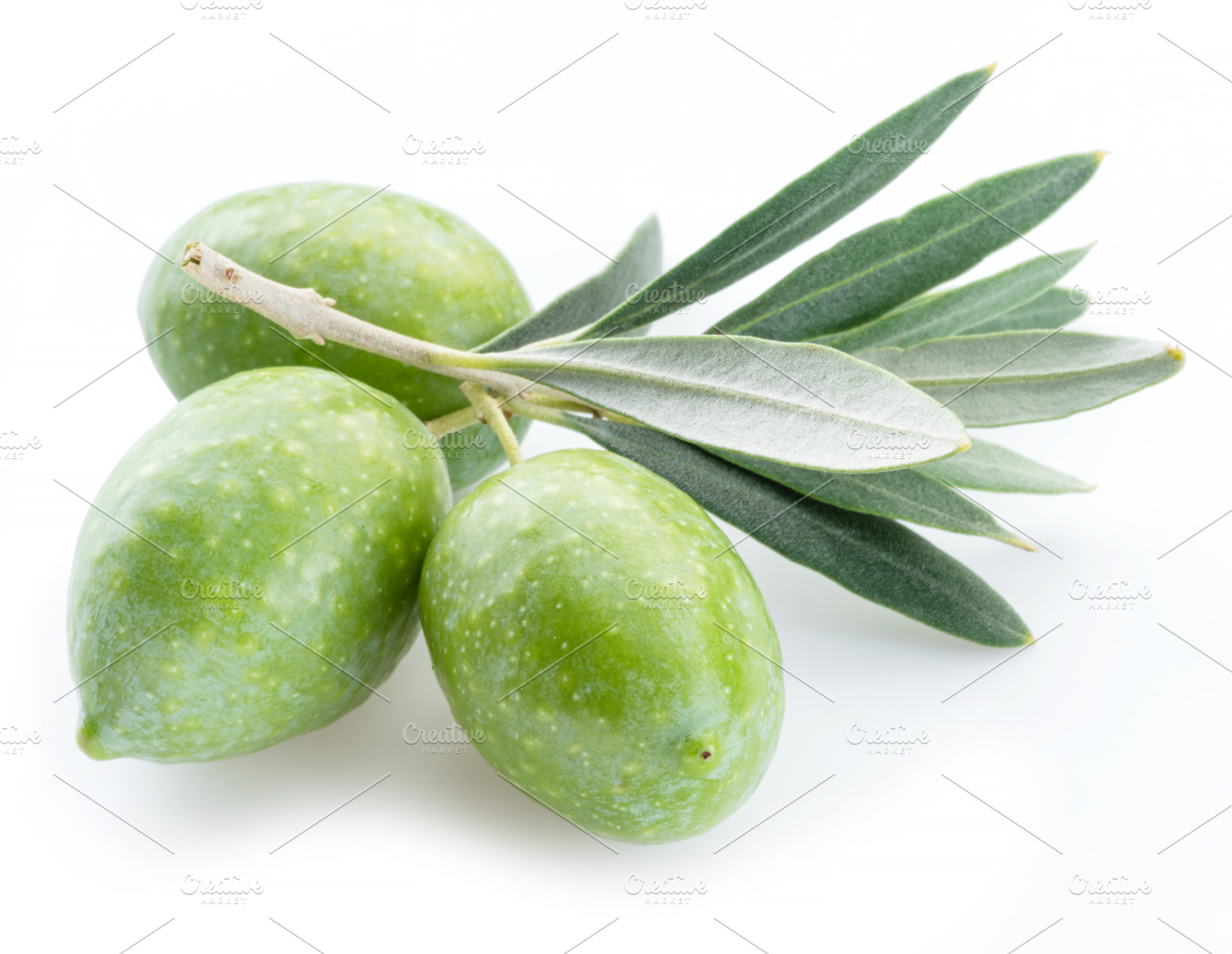 Green natural olives with leaves isolated on a white background., a Food & Drink Photo by Volff