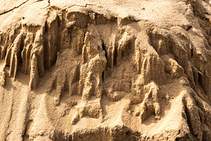 mountain of sand yellow sand texture, a Nature Photo by VetalStock