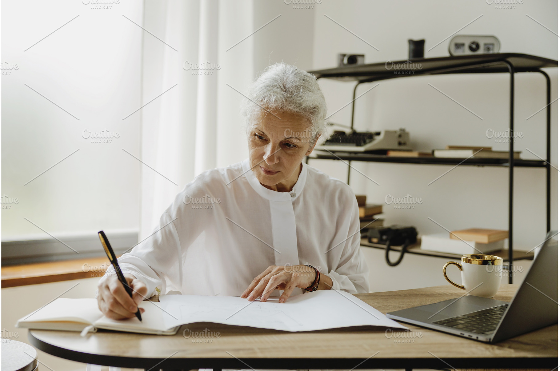 Stylish gray haired mature business, a Person Photo by Aliona Serzhanova