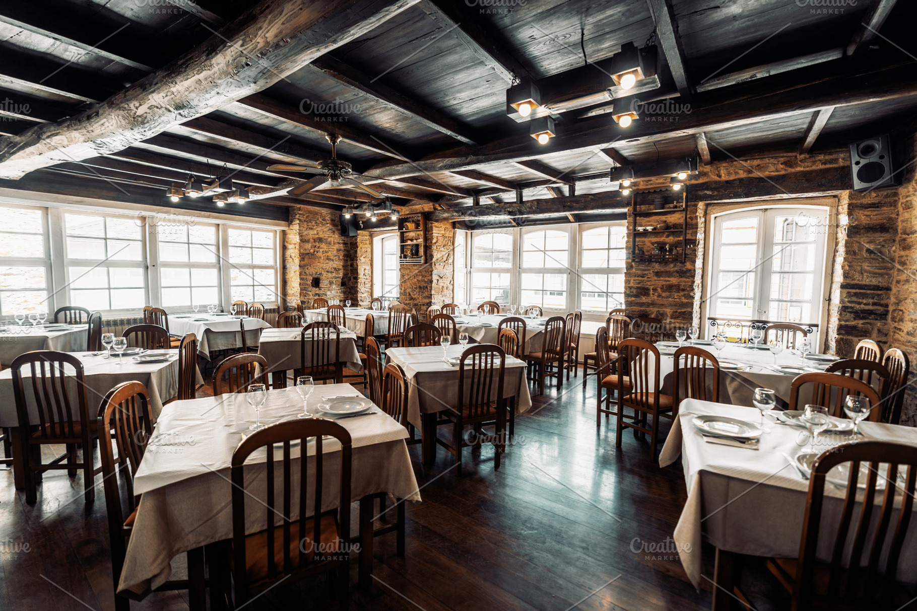 Rustic restaurant dining room, an Industrial Photo by SkyNext