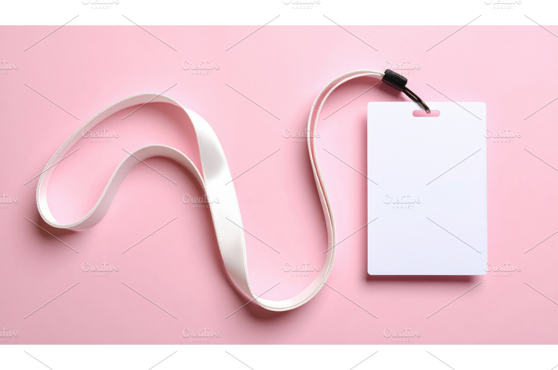 An ID badge with a white lanyard, a Business Photo by Igor Tichonow
