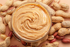Bowl of peanut butter and peanuts, a Food & Drink Photo by Volff