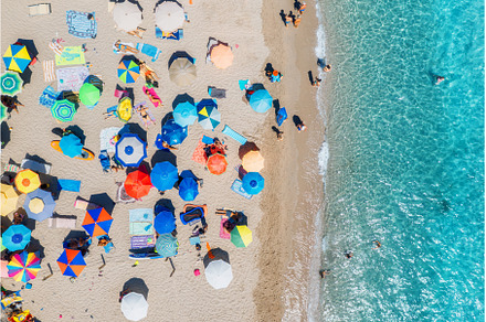 Aerial view of colorful umbrellas on, a Nature Photo by den-belitsky