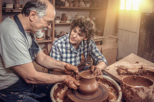 Master Teaching Pottery on Spinning Wheel, an Arts & Entertainment Photo by Davizro's Market