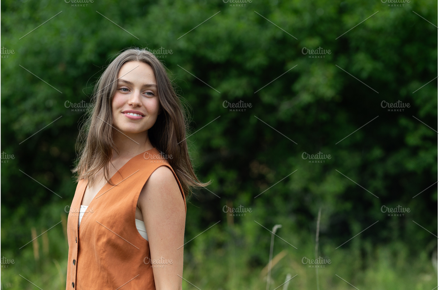 Portrait of young woman smiling, a Person Photo by HalfPoint