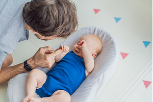 Loving father interacts with his 3, a Person Photo by Elizaveta Galitskaya