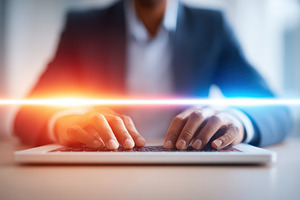 Hands typing on a laptop in a modern workspace, a Business Photo by AlyaAnd