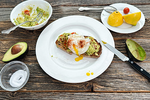 Avocado toast with poached egg on ru, a Food & Drink Photo by 1miromiro