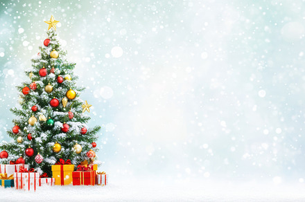 Decorated snow-covered Christmas tree with red, gold, and white ornaments, surr, a Holiday Photo by Mashimara
