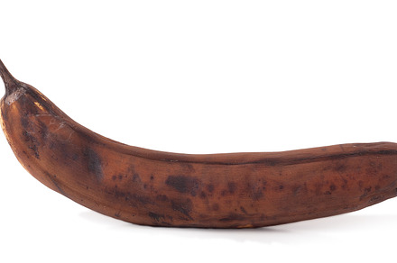 Rotten banana isolated on white featuring banana, rotten, and isolated, a Food & Drink Photo by NataPhoto