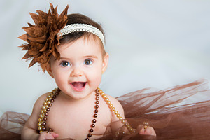 Baby ballerina in brown tutu stock photo containing baby and ballerina