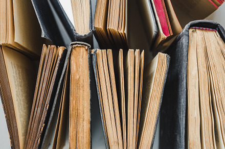 Stack of vintage books lying on the table, a School & Education Photo by Svetlana Barchan