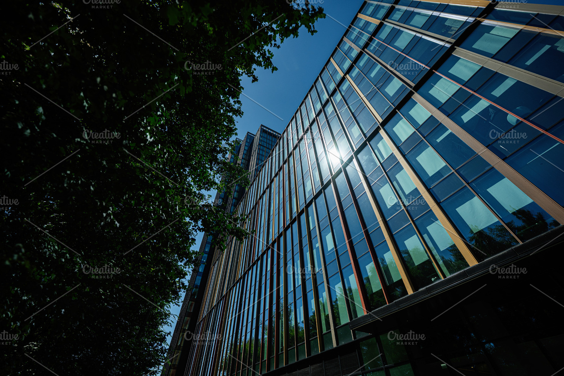 Modern glass building in Warsaw highlighting contemporary architectural design, a Photo by AS photostudio