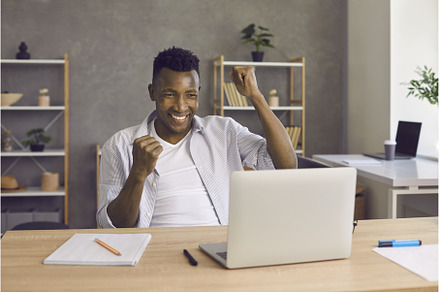 Portrait of excited happy African, a Person Photo by StudioRomantic