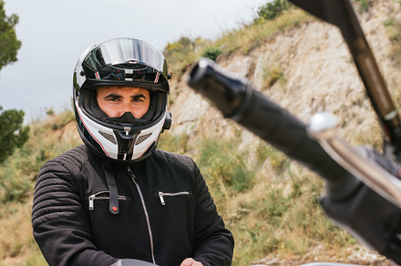 Biker with helmet on containing biker, motorcycle, and motorbike, a Sports & Recreation Photo by Harry Rendón