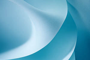 Abstract blue waves flowing creating elegant curves and shadows, a Photo by Studio ANNA
