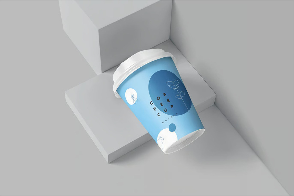 9 oz Paper Coffee Cup Mockup, a Cups & Container Mockup by megostudi0 (Photo 1 of 2)