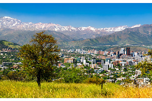 Panoramic view of Santiago skyline and Andes mountains in Chile, an Architecture Photo by Leonid Andronov
