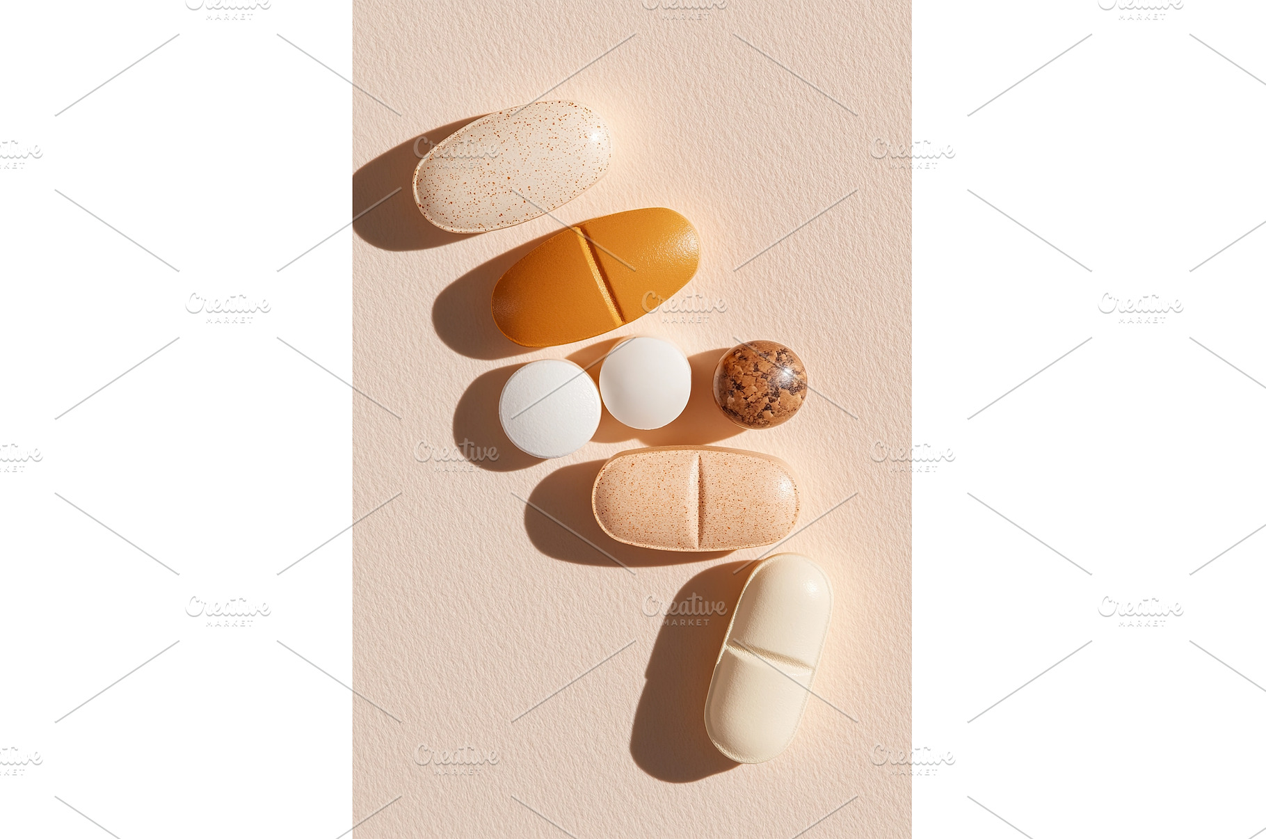 Assorted pills on neutral background, a Health & Medical Photo by Lermont51