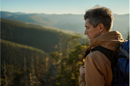 Portrait man traveler with backpack, a Nature Photo by vitaliymateha photography