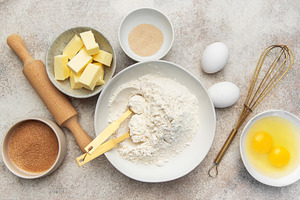 Baking ingredients flat lay preparing homemade pastry dough, a Food & Drink Photo by Olena Rudo
