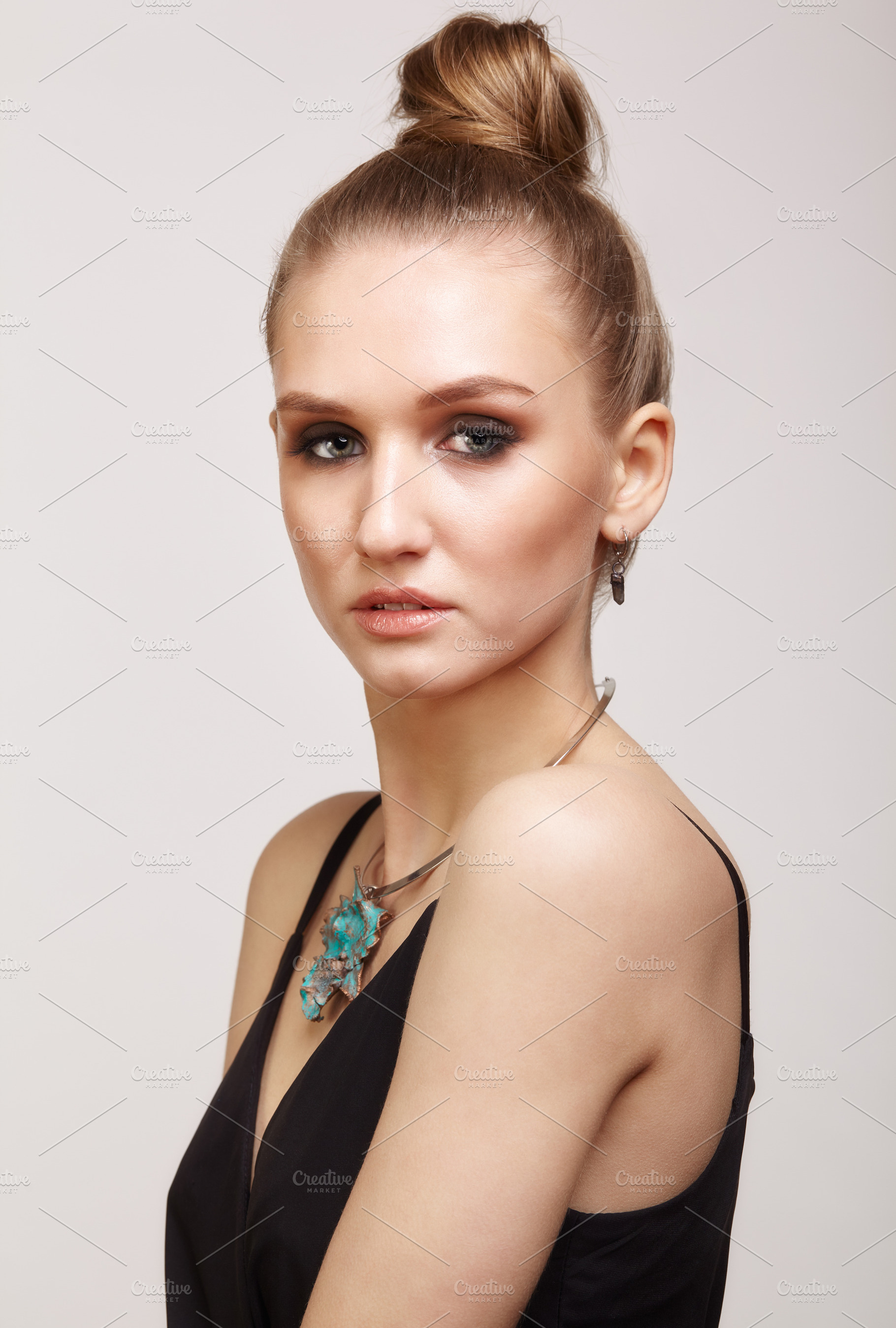 Beautiful woman in collar and earrings in form of leaf, a Beauty & Fashion Photo by Zastavkin