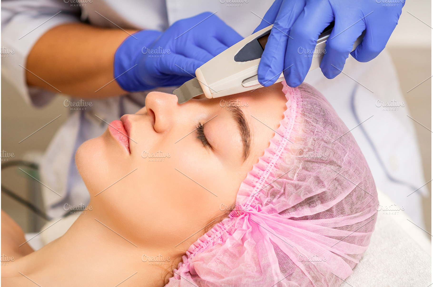 Young caucasian woman receiving, a Health & Medical Photo by okskukuruza